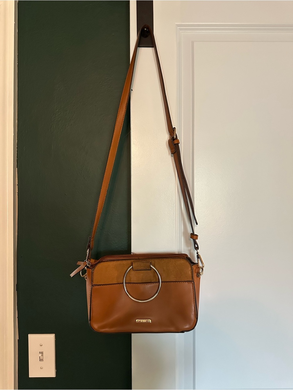 Leather Crossbody Bag with Signature Ring Accent in Brown